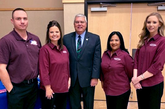 Pictured from left to right: Texas Talent Connection Coordinator, Justin Miller; Business Services Consultant, Mandee Kennedy; Executive Director, Edward Serna, TWC; Lead Business Services Consultant, Alma Pedroza; and Business Services Consultant, Margaret Brothers.